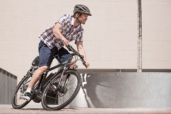 Urban cyclist illustrating how far you can go on a Urban ebike